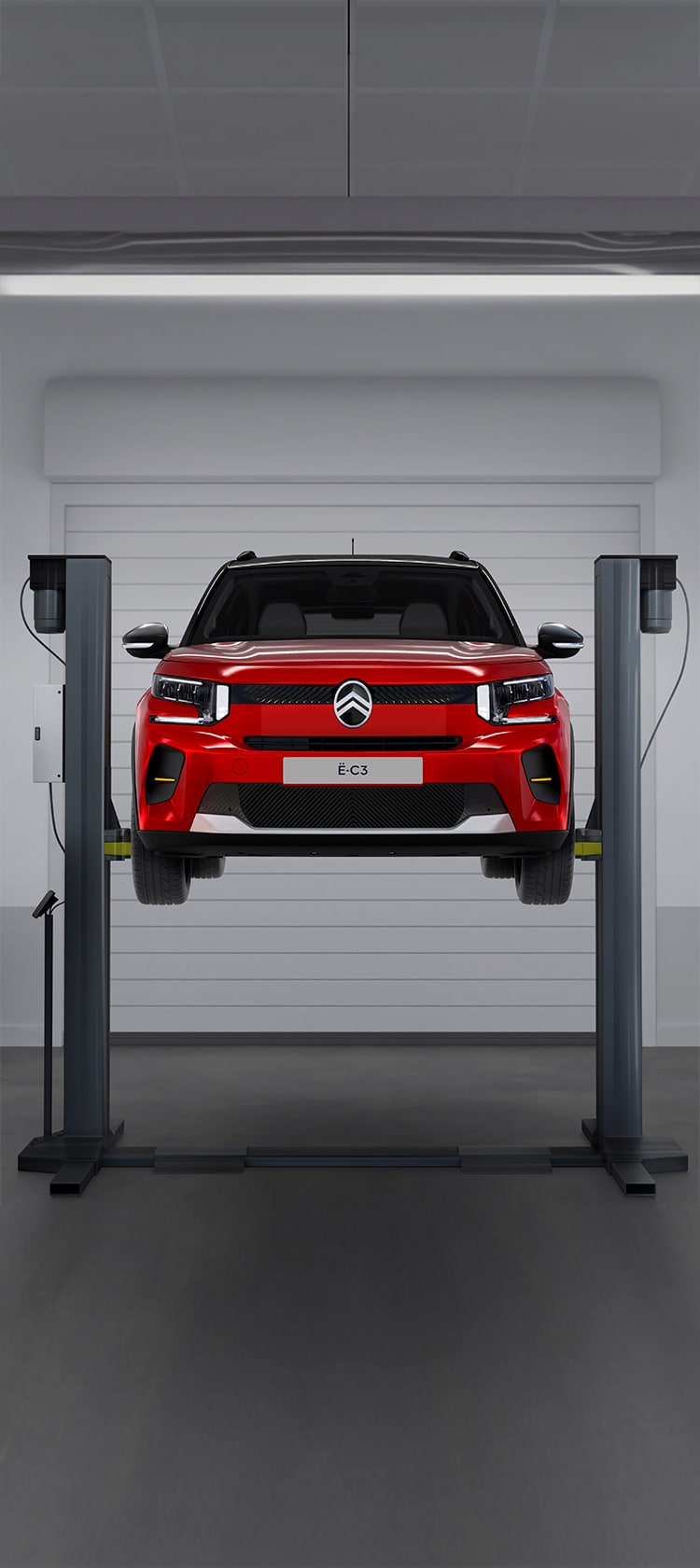 C3 dans atelier de réparation sur fond gris